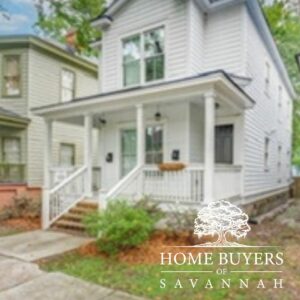 traditional white home purchased for renovation by home buyers of savannah